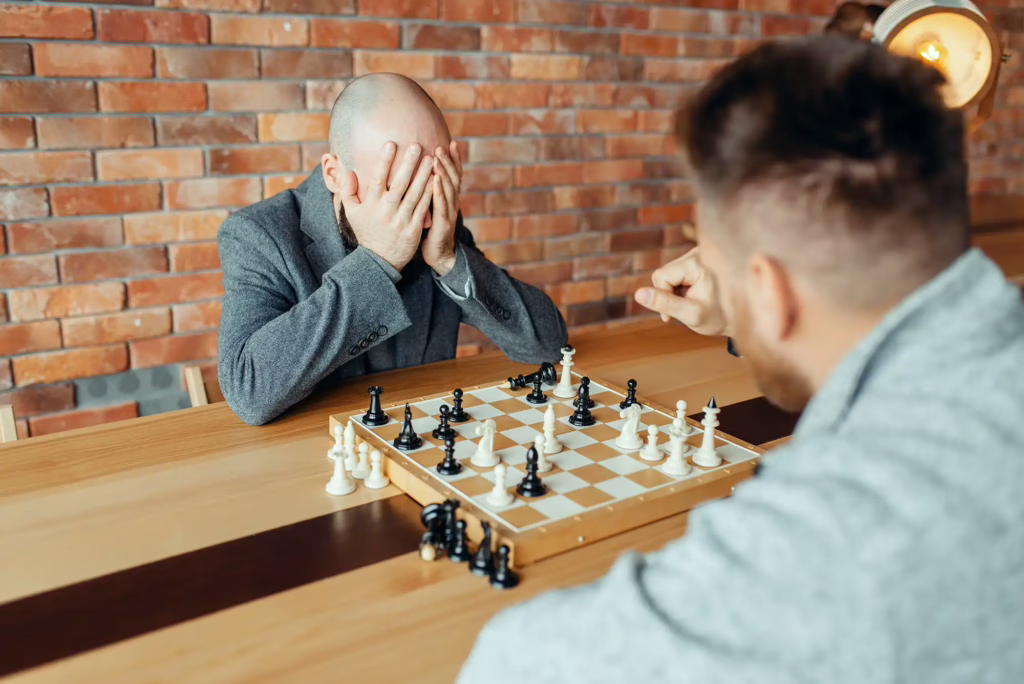 Emotionale Kontrolle Schach male chess players playing white wins mate